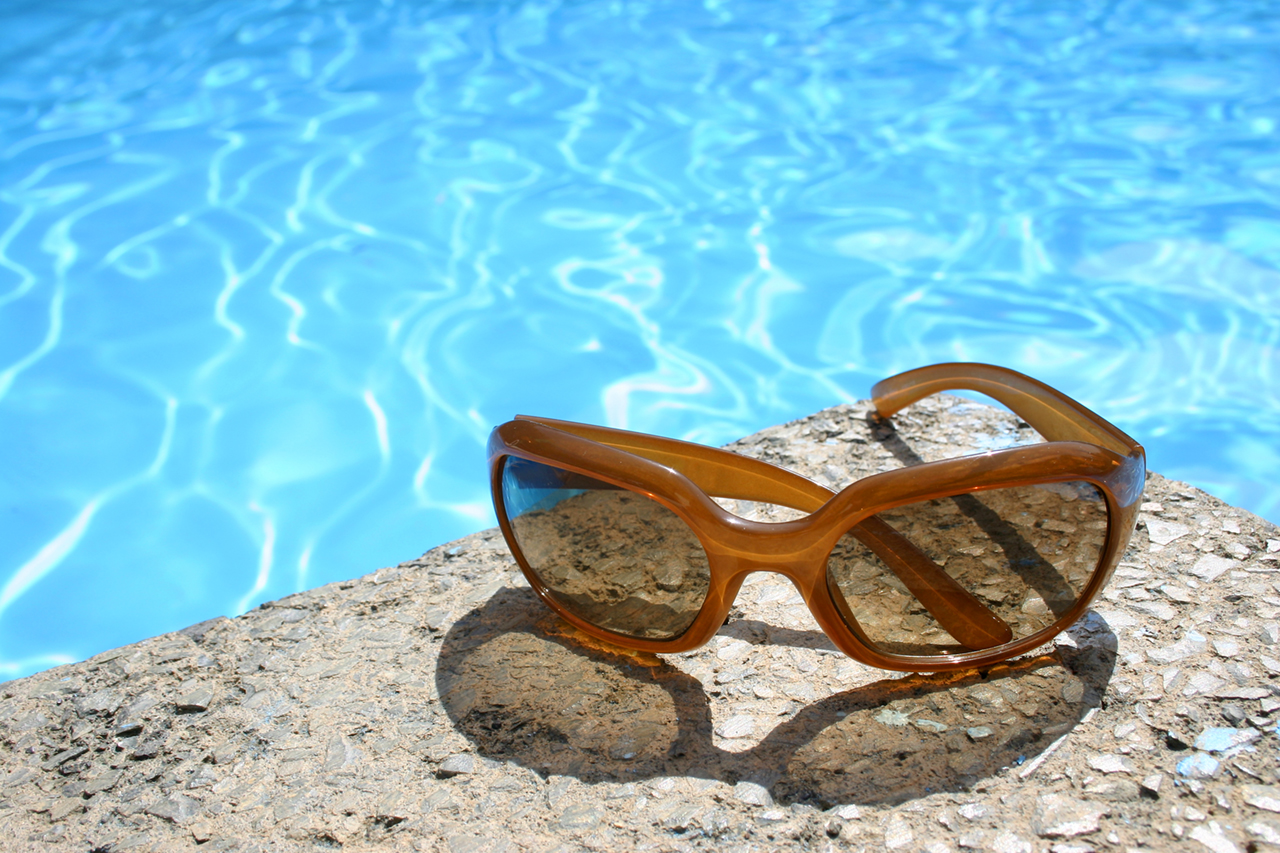 glasses by the pool